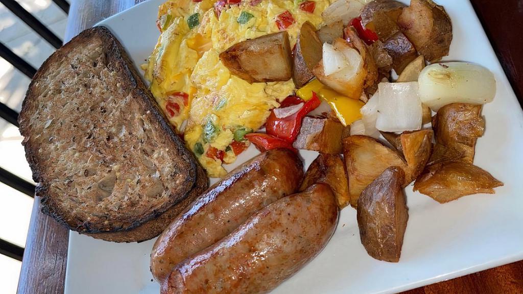 The House Breakfast · Two eggs, home fries, whole wheat toast and choice of sausage, Canadian bacon, bacon, ham or chicken apple sausage with American coffee.