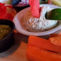 Smoked Fish Dip · Sliced jalapenos, chopped red onion, carrots, celery, and crispy tortilla chips.