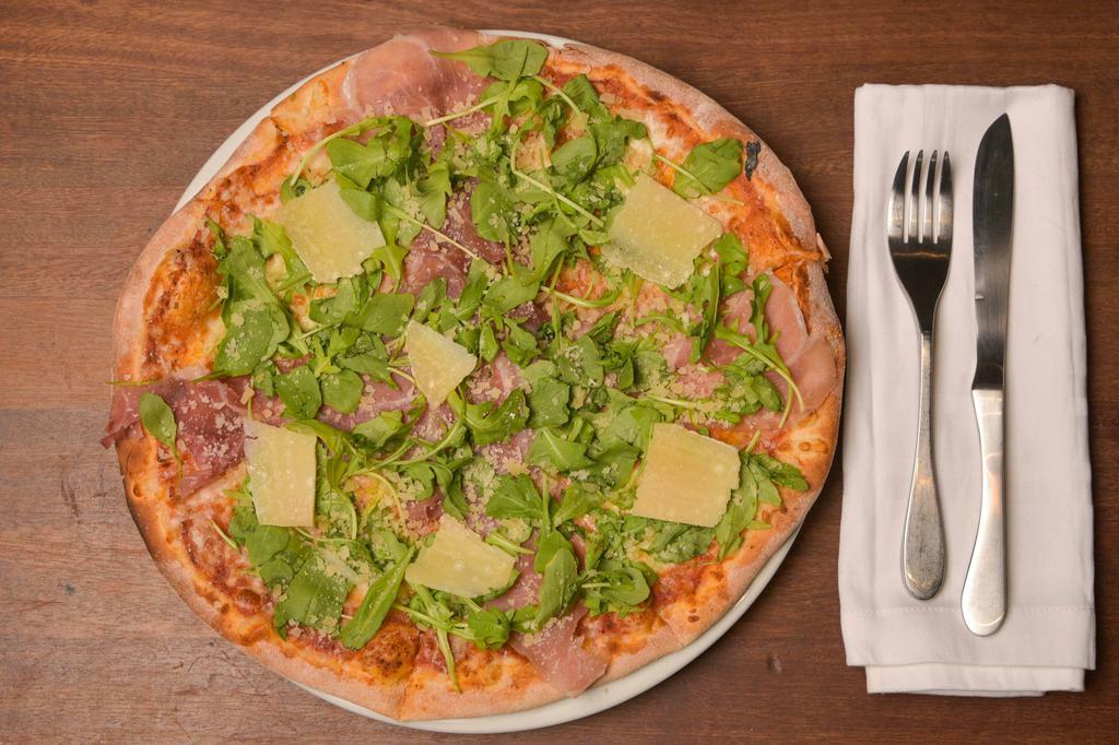 Prosciutto Pizza · Prosciutto, tomato sauce, fresh mozzarella, shaved parmesan, and arugula.