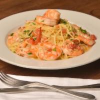 Shrimp Scampi Pasta · Sautéed shrimp and linguine pasta tossed in a white wine with garlic butter sauce.