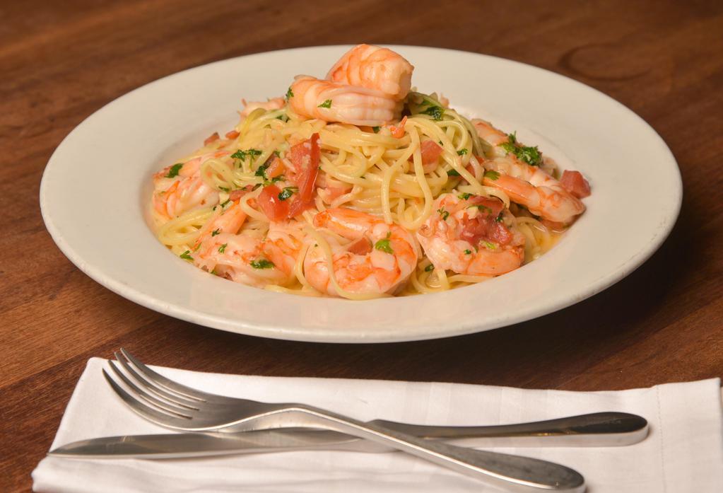 Shrimp Scampi Pasta · Sautéed shrimp and linguine pasta tossed in a white wine with garlic butter sauce.