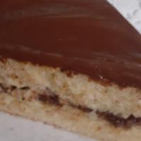 Yellow Cake With Chocolate Icing · A slice of delicious yellow cake with chocolate frosting.