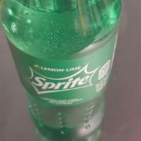 Sprite 16.9Oz · Refreshing Coke product.