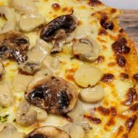 Nostra Bianca · White italian Alfredo sauce, fresh mozzarella, mushrooms.