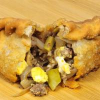 Meat · Empanadas stuffed with  meat boiled egg,olivesand tasty flavors