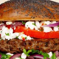 Assyrian Arook Burger · Served on choice of pita bread or onion roll, lettuce, tomato, cheese, feta, pickle with ros...