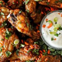 10-Piece Baked Wings · Bone-in. Includes one dipping sauce of choice, served with small French fries.