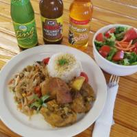 Curry Chicken · Served with rice and peas or white rice with steamed vegetables and plantains.
