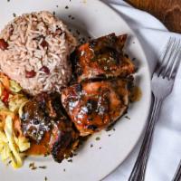 Reggae Jerk Chicken · W/steamed vegetables or salad and choice of rice.