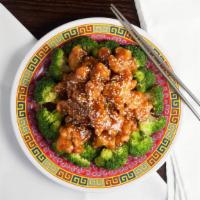 Sesame Chicken · Crispy lightly breaded chicken w. broccoli in tangy sauce.