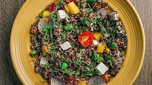 Quinoa Salad · Rainbow quinoa, mix greens, cherry tomatoes, cucumber, radish, queso fresco, vinaigrette dressing.