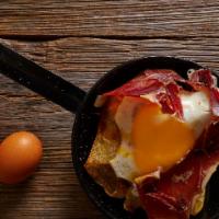 Huevos Rotos Con Jamón Ibérico / Scrambled Eggs With Iberian Ham · Delicioso huevos frescos revueltos con jamón ibérico. / Delicious fresh scrambled eggs with ...