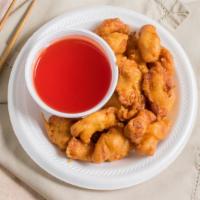 Sweet & Sour Chicken · Breaded white meat chicken with homemade red sweet & sour sauce on the side.