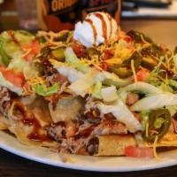 Bbq Nachos · Fried corn tortilla chips with pulled pork,bbq sauce,queso dip,lettuce, tomatoes,jalepenos &...