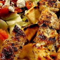 Chicken Souvlaki · Grilled marinated chicken. Served with Greek salad, pita, and Greek potatoes or french fries.