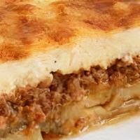 Moussaka · Ground beef, eggplant, and potato. Served with Greek salad, pita, and Greek potatoes or fren...