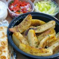 Gyro Box · 6 Warm toasty Pita
container of Gyro Meat
Container of Greek Potatoes
Tzatziki
tomato and on...