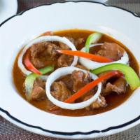 Lambi (Stew Conch) · Conch in creole sauce.