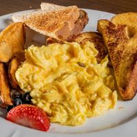 Tamarac Breakfast · 2 eggs your way
Choice of French Toast, Pancakes, or Waffle
Breakfast Potatoes or Grits
Baco...