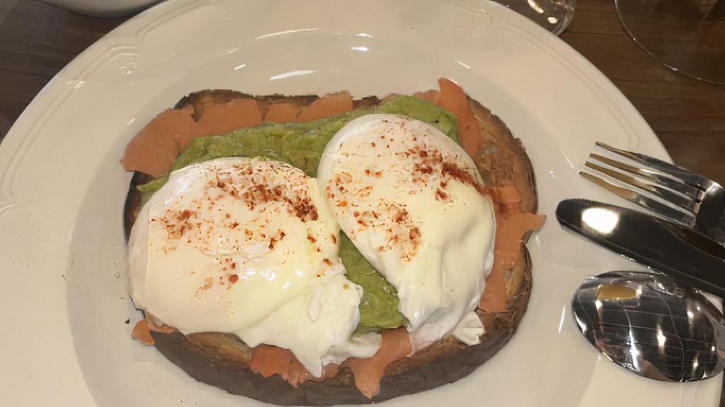 Salmon, Egg & Avocado Toast · Toasted multigrain sourdough topped with smoked salmon, avocado and a poached egg. Add bacon for extra cost.