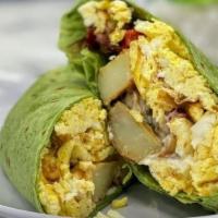 Good Day , Every Day Wrap · 2 scrambled eggs, bacon, mini seasoned potatoes with our special cilantro - garlic sauce, ro...