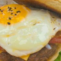 House Beef Burger/ Egg · 100% Homemade Beef Burger, Cheese, Bacon, an Egg. French Fries