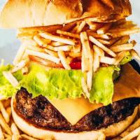 Spanglish Cheeseburger · Beef and chorizo burger, American cheese, grilled onions, lettuce, tomato, string potatoes, ...