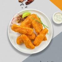 Baffled King Buffalo Tenders · Chicken tenders breaded and fried until golden brown before being tossed in buffalo sauce.