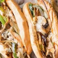 Philly Chicken Cheesesteak · Sliced chicken, melted cheese, grilled onions, roasted peppers, sauteed mushrooms, hoagie ro...