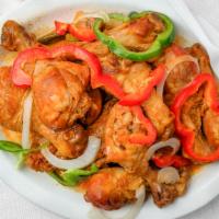 Poulet/Stew Chicken · Stew chicken. Includes rice and beans or white rice with beans, fried plantains.