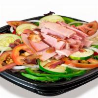 Farmhouse Salad · Ham, Turkey, Bacon, Provolone Cheese, Tomatoes, Onions, Cucumbers, Red & Green Peppers, & Mi...