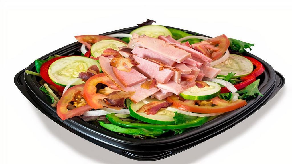 Farmhouse Salad · Ham, Turkey, Bacon, Provolone Cheese, Tomatoes, Onions, Cucumbers, Red & Green Peppers, & Mixed Greens