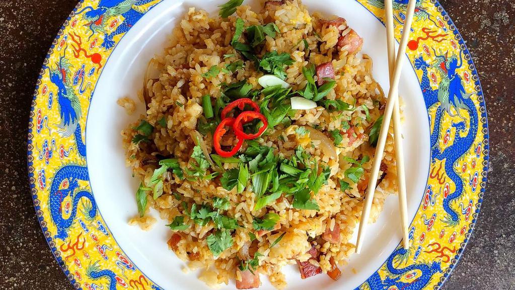 House Fried Rice - China · Flavor packed Chinese staple...cabbage, carrot, egg, green peas & onion sauteed with savory oza sauce