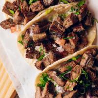 Carne Asada (3 Tacos) · Angus skirt steak, guacamole, pico de gallo, alioli.