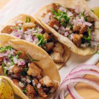 Pork Belly (3 Tacos) · Crispy pork belly, onion, cilantro.