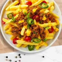 Chili Cheer Cheese Fries · Crinkly cut fries cooked until golden brown and garnished with season salt, melted cheddar c...