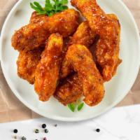 Chicken Cheer Wings · Fresh chicken wings breaded and fried until golden brown. Served with a side of ranch or ble...