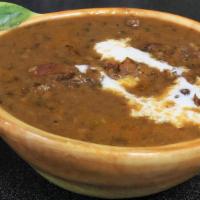 Dal Makhani (16 Oz.) · Whole black lentil made with Butter, onion, garlic, spices and Cream. No Sides.