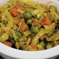 Cabbage Peas Carrot (16 Oz.) · Mild dry curry. No Onion. No Garlic. No Sides.