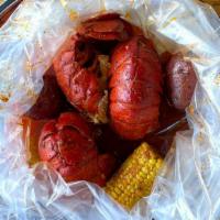 Lobster Tail (2) · Comes with one corn and two potatoes. Add two boiled eggs or 1/2 lb sausage for an additiona...