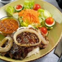 Steak Teriyaki Bowl · grilled new york strip with a light teriyaki glaze, onions, served over rice & house salad