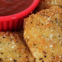 Toasted Ravioli · Meat ravioli served golden brown with our homemade sauce.