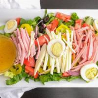 Chef'S Salad · Ham, turkey, cheese, hard-boiled eggs and tomatoes over mixed green.