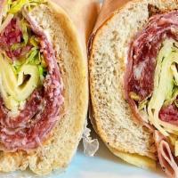 Italian Hero Cold Sandwich · A combination of ham, salami, pepperoni and provolone cheese topped with lettuce, tomatoes, ...