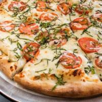 Personal Florentine Pizza · Spinach, ricotta cheese, fresh garlic and tomatoes topped with mozzarella cheese.