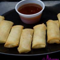 Veggie Spring Rolls · Cabbage, celery, carrots, green onions, and Chinese noodles, in a crispy wonton wrapper. ser...