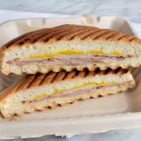 Cuban Style Havana Sandwich · Roast turkey breast, black forest ham, Swiss cheese, mayonnaise, and mustard. Served on gril...