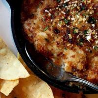 Imperial Dip · A delicious blend of tender shrimp, lump crab, Mozzarella and Parmesan cheeses, served with ...