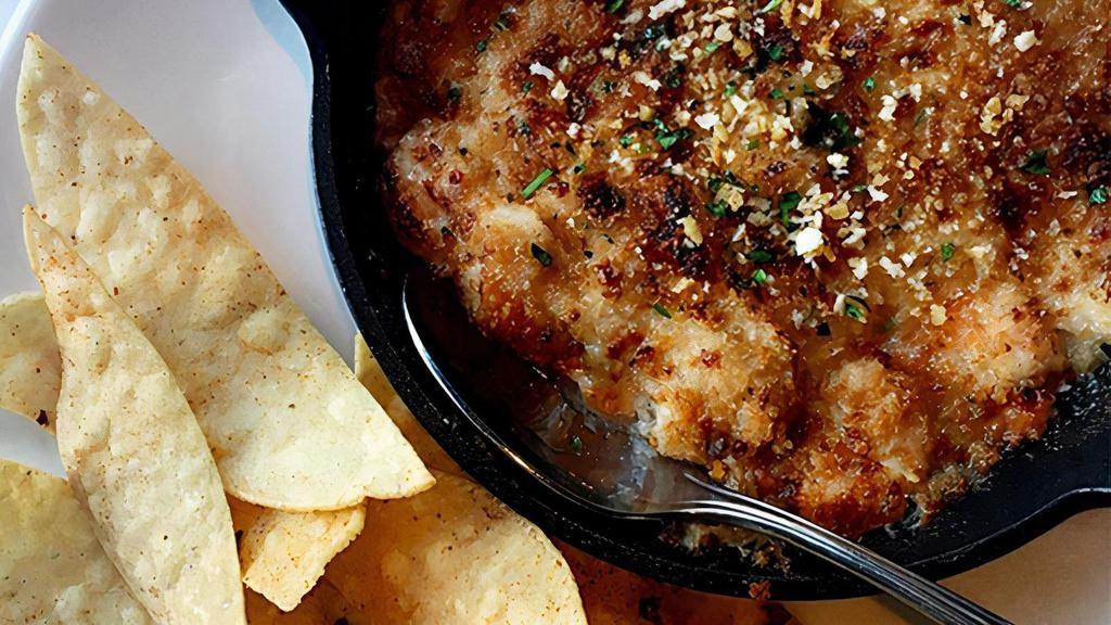 Imperial Dip · A delicious blend of tender shrimp, lump crab, Mozzarella and Parmesan cheeses, served with seasoned house-made tortilla chips  (1150 cal)
