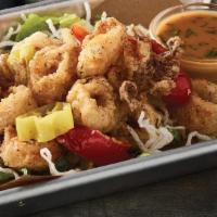 Calamari  · Tender calamari and julienned red peppers lightly breaded and fried. Accompanied with a side...